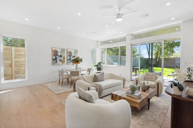 613 Clifford Dr Unit B, Austin, TX 78745 - living area with light wood-style floors, recessed lighting, plenty of natural light, and a ceiling fan