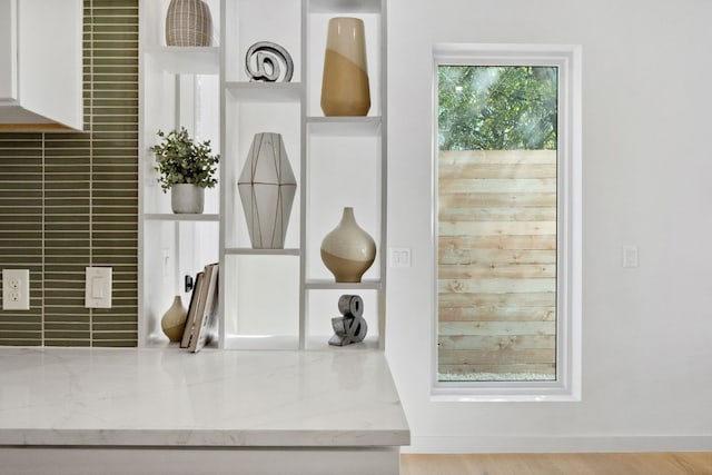 613 Clifford Dr Unit B, Austin, TX 78745 - detailed view of light stone counters and white cabinetry