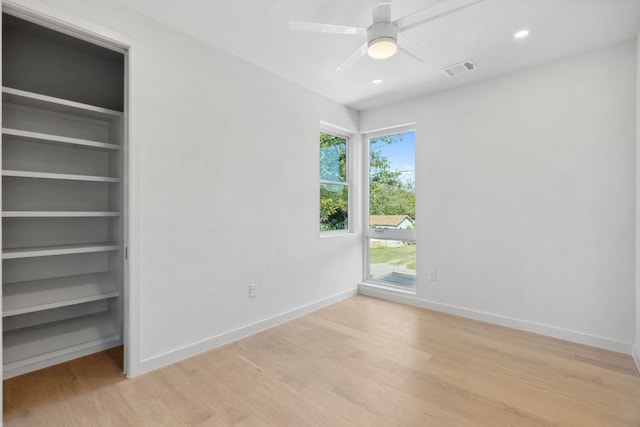 613 Clifford Dr Unit B, Austin, TX 78745 - unfurnished bedroom with light wood-style flooring, baseboards, recessed lighting, and a ceiling fan