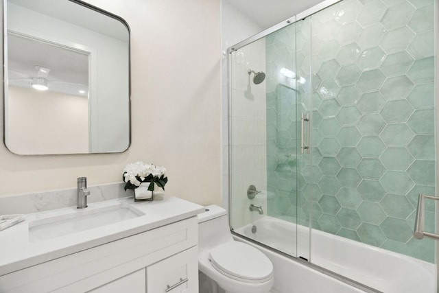613 Clifford Dr Unit B, Austin, TX 78745 - bathroom featuring combined bath / shower with glass door, vanity, and toilet