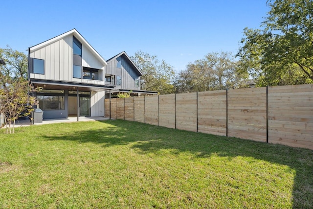613 Clifford Dr Unit B, Austin, TX 78745 - back of house with a patio area and board and batten siding