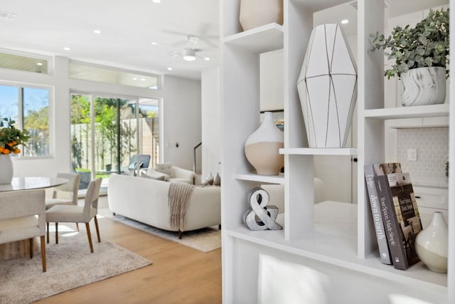 613 Clifford Dr Unit B, Austin, TX 78745 - living room featuring healthy amount of natural light, wood finished floors, a ceiling fan, and recessed lighting