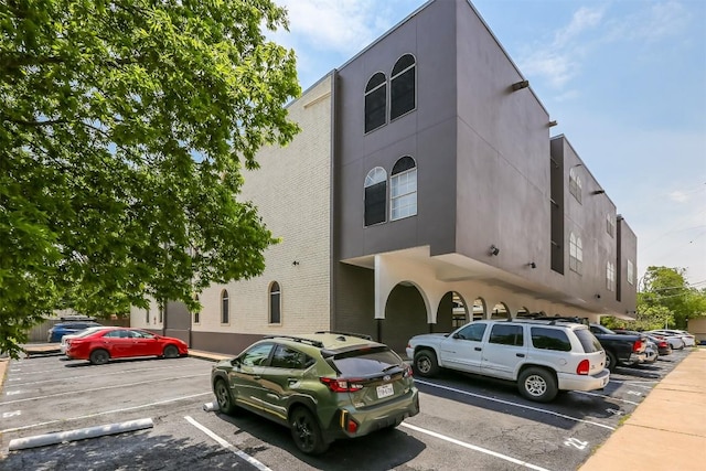 101 E 33rd St Unit 107, Austin, TX 78705 - view of property featuring uncovered parking