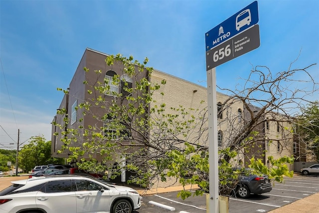 101 E 33rd St Unit 107, Austin, TX 78705 - view of property featuring uncovered parking