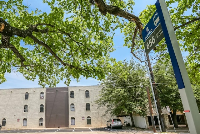 101 E 33rd St Unit 107, Austin, TX 78705 - view of building exterior with uncovered parking
