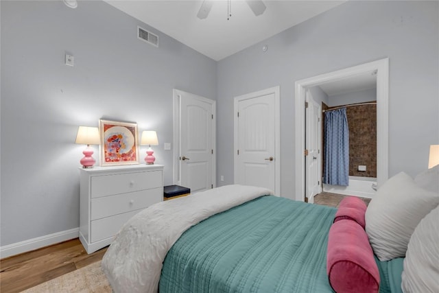 101 W Bank Unit 43, Llano, TX 78657 - bedroom featuring baseboards, wood finished floors, and a ceiling fan