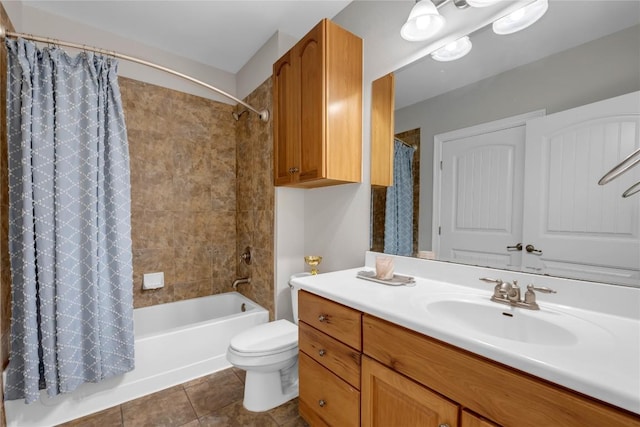 101 W Bank Unit 43, Llano, TX 78657 - full bathroom featuring toilet, shower / bathtub combination with curtain, tile patterned flooring, and vanity
