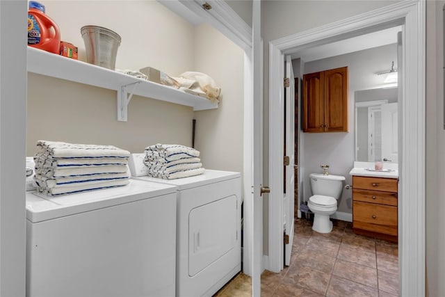 101 W Bank Unit 43, Llano, TX 78657 - clothes washing area featuring washer and clothes dryer and light tile patterned floors