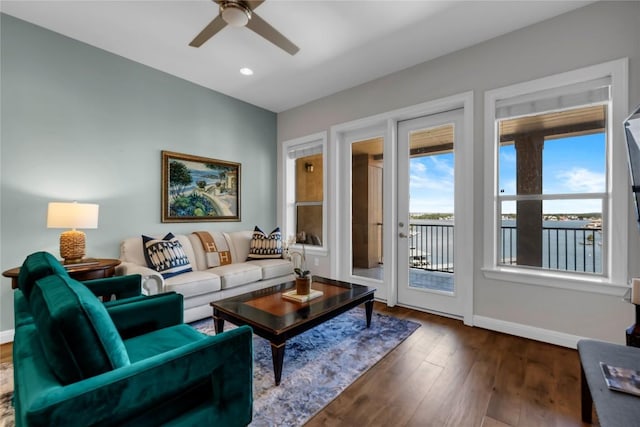101 W Bank Unit 43, Llano, TX 78657 - living area featuring baseboards, ceiling fan, wood finished floors, and recessed lighting