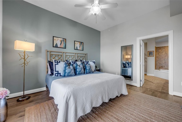101 W Bank Unit 43, Llano, TX 78657 - bedroom with wood finished floors, baseboards, and ceiling fan