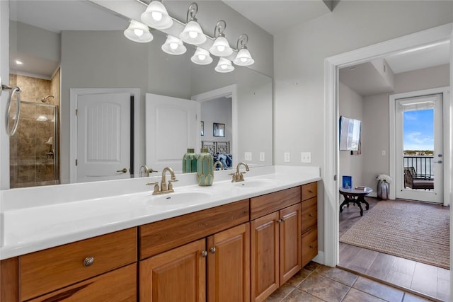 101 W Bank Unit 43, Llano, TX 78657 - full bathroom featuring double vanity, tile patterned floors, and tiled shower