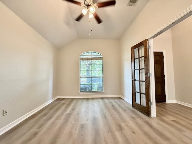 4233 Fairmeadow Dr, Round Rock, TX 78665 - unfurnished room with wood finished floors, ceiling fan, lofted ceiling, and baseboards