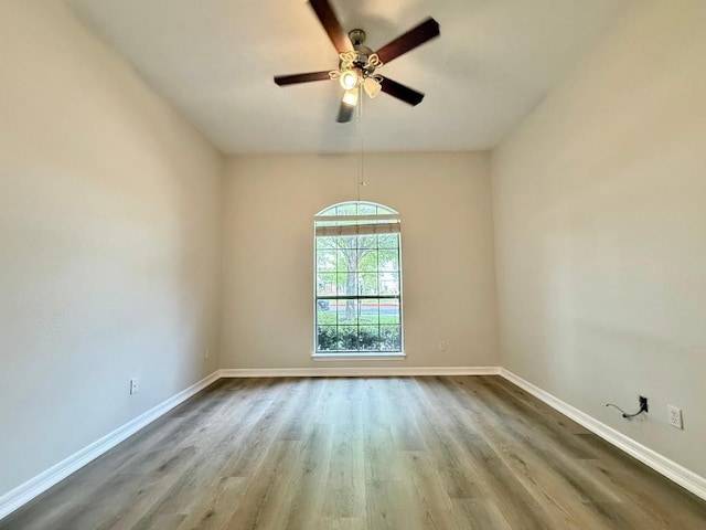 4233 Fairmeadow Dr, Round Rock, TX 78665 - empty room featuring wood finished floors, baseboards, and a ceiling fan