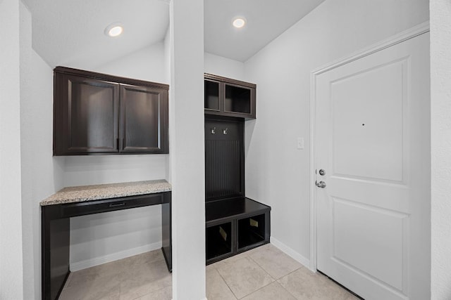 mudroom featuring light tile patterned floors, baseboards, and recessed lighting