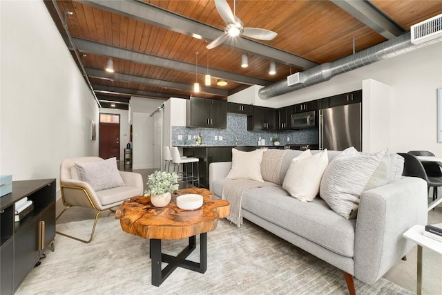 living area with beamed ceiling, ceiling fan, wood ceiling, and light wood-style floors
