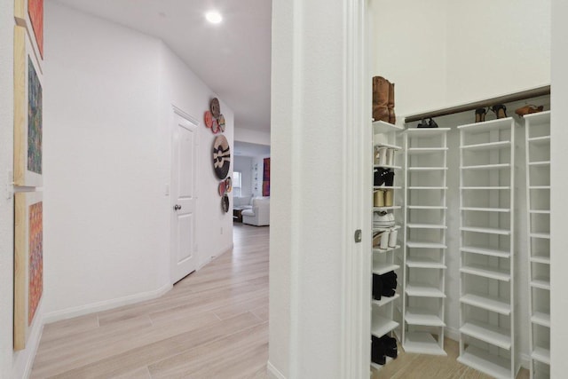 1107 Cadence Dr, Pflugerville, TX 78660 - hallway with light wood finished floors