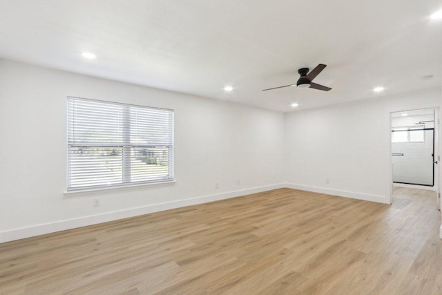 12127 Cabana Ln, Austin, TX 78727 - empty room featuring light wood finished floors, a ceiling fan, and recessed lighting