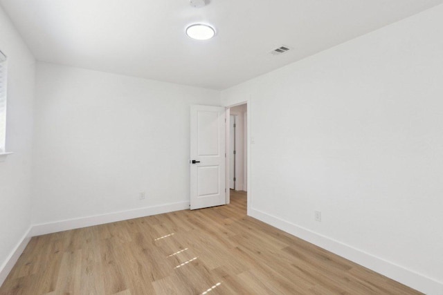 12127 Cabana Ln, Austin, TX 78727 - spare room featuring light wood-type flooring and baseboards