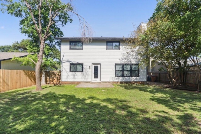 rear view of house with a patio