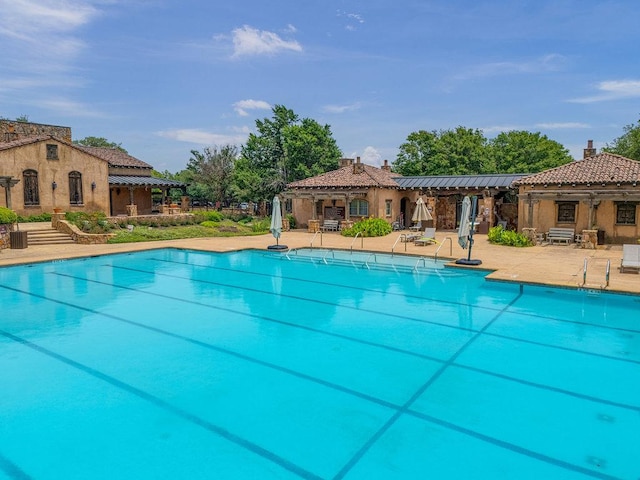 225 Cimarron Hills Trl E, Georgetown, TX 78628 - community pool featuring a patio area and a gazebo