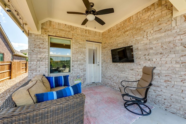 22208 Coyote Cave Trl, Spicewood, TX 78669 - view of patio featuring a ceiling fan and an outdoor living space