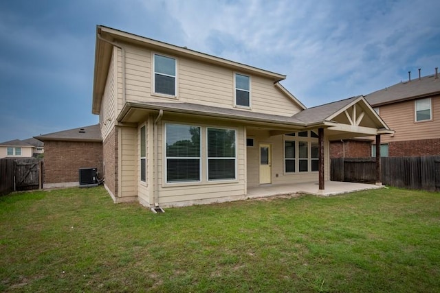 217 Orchard Hill Trl, Buda, TX 78610 - rear view of property featuring a patio area and cooling unit