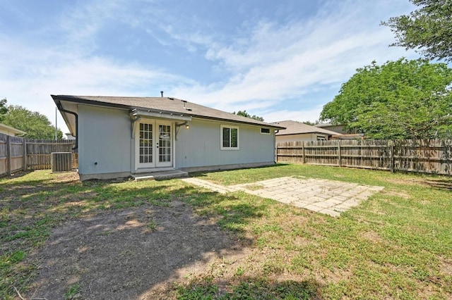 6725 Broad Brook Dr, Austin, TX 78747 - back of house with french doors, cooling unit, and a patio