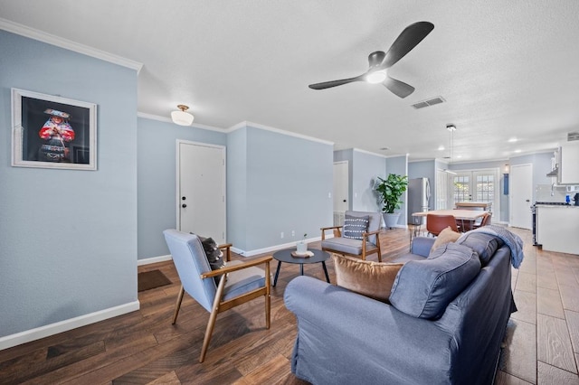 6725 Broad Brook Dr, Austin, TX 78747 - living area featuring baseboards, ornamental molding, wood finished floors, and ceiling fan