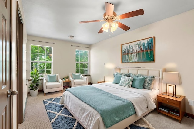 1203 Haynes St, San Marcos, TX 78666 - bedroom with carpet flooring and ceiling fan