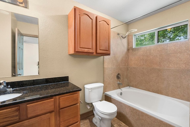 1203 Haynes St, San Marcos, TX 78666 - bathroom with vanity and tiled shower / bath combo