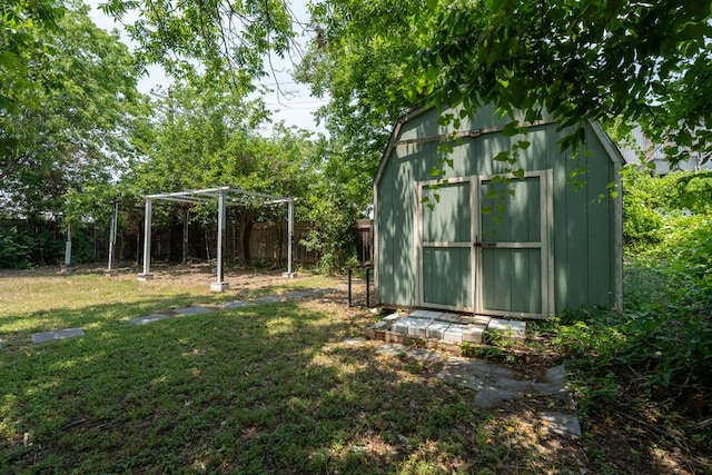 1203 Haynes St, San Marcos, TX 78666 - fenced backyard with a storage shed