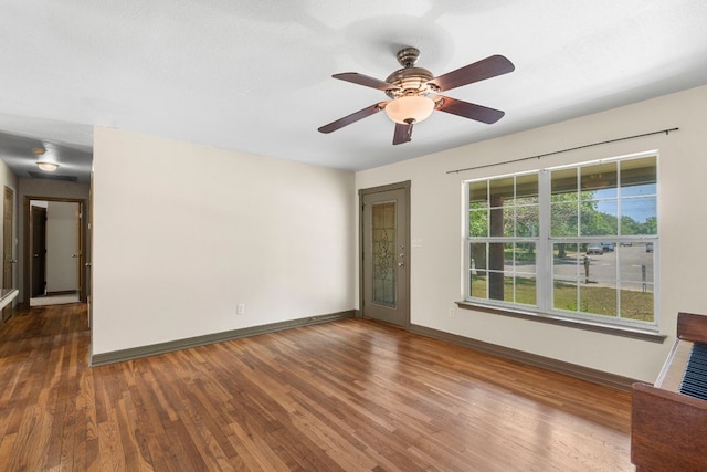 1203 Haynes St, San Marcos, TX 78666 - spare room featuring wood finished floors and a ceiling fan