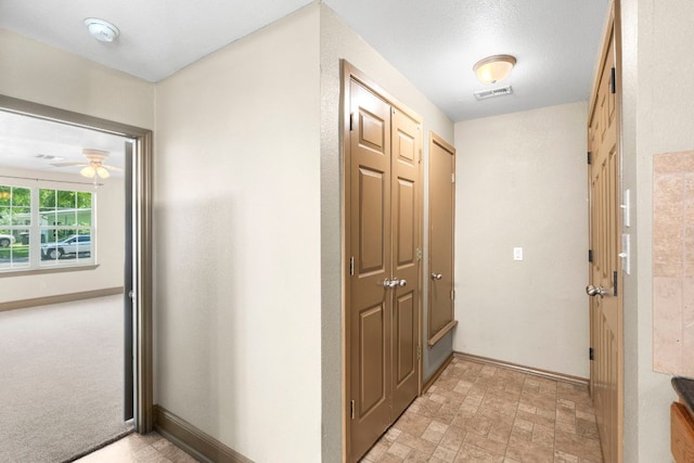 1203 Haynes St, San Marcos, TX 78666 - hallway featuring baseboards