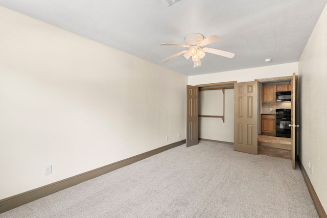 1203 Haynes St, San Marcos, TX 78666 - unfurnished bedroom with light carpet, a closet, and ceiling fan