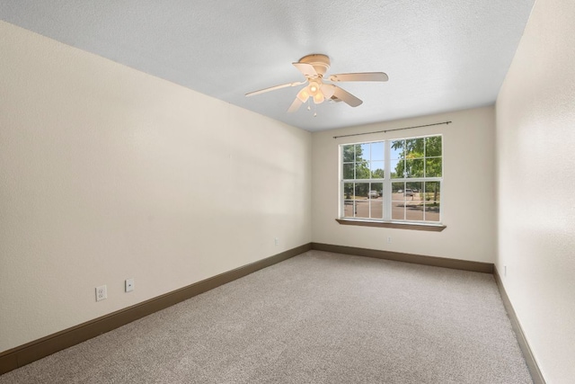 1203 Haynes St, San Marcos, TX 78666 - unfurnished room featuring carpet and ceiling fan
