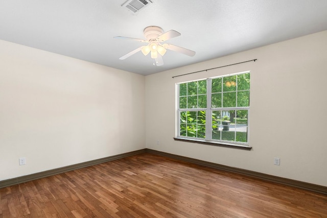 1203 Haynes St, San Marcos, TX 78666 - empty room featuring wood finished floors and ceiling fan