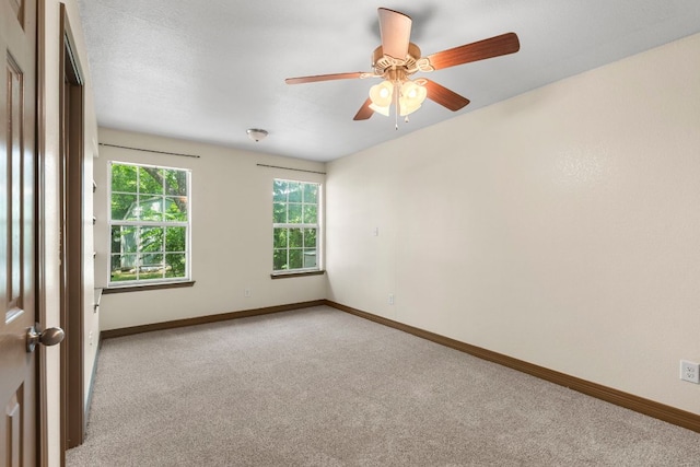 1203 Haynes St, San Marcos, TX 78666 - spare room featuring light carpet and ceiling fan