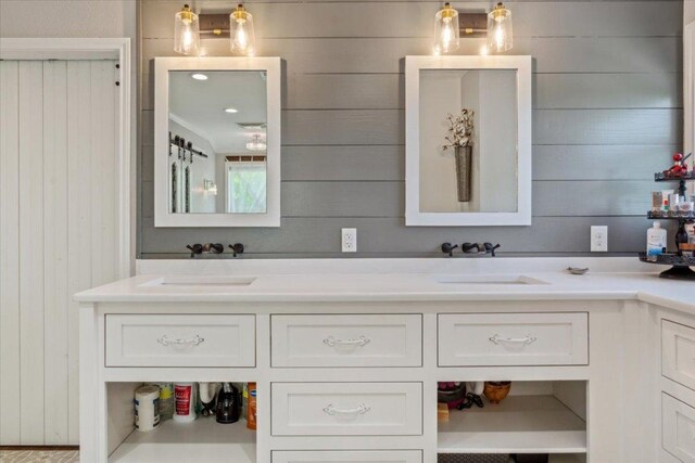 2901 Olympia Dr, Temple, TX 76502 - bathroom with wood walls and double vanity