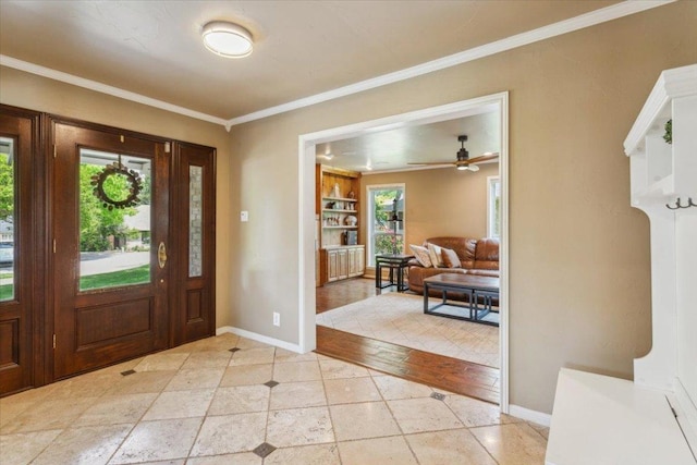 2901 Olympia Dr, Temple, TX 76502 - foyer with ornamental molding, baseboards, and ceiling fan