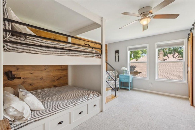 2901 Olympia Dr, Temple, TX 76502 - bedroom with light colored carpet, baseboards, and a ceiling fan