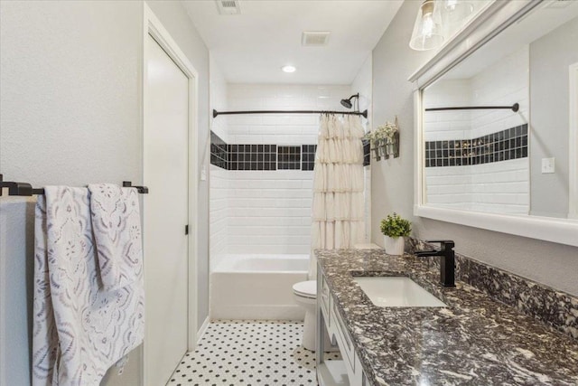 2901 Olympia Dr, Temple, TX 76502 - bathroom featuring vanity, shower / tub combo with curtain, toilet, recessed lighting, and tile patterned floors