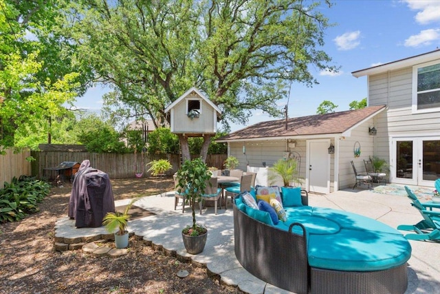 2901 Olympia Dr, Temple, TX 76502 - view of patio / terrace with french doors, a fenced backyard, and an outdoor hangout area