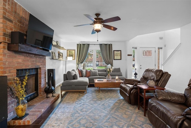 1303 Shady Grove Path, Cedar Park, TX 78613 - living area with ceiling fan, a fireplace, baseboards, and wood finished floors