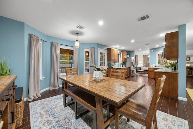 1303 Shady Grove Path, Cedar Park, TX 78613 - dining area with dark wood finished floors, recessed lighting, and baseboards