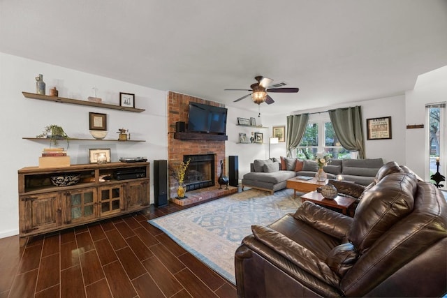 1303 Shady Grove Path, Cedar Park, TX 78613 - living area featuring ceiling fan, a fireplace, and dark wood-type flooring