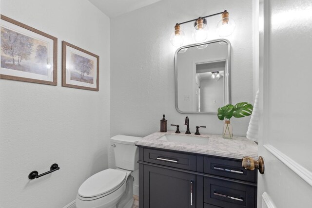 11708 Rotherham Dr, Austin, TX 78753 - bathroom featuring vanity and toilet
