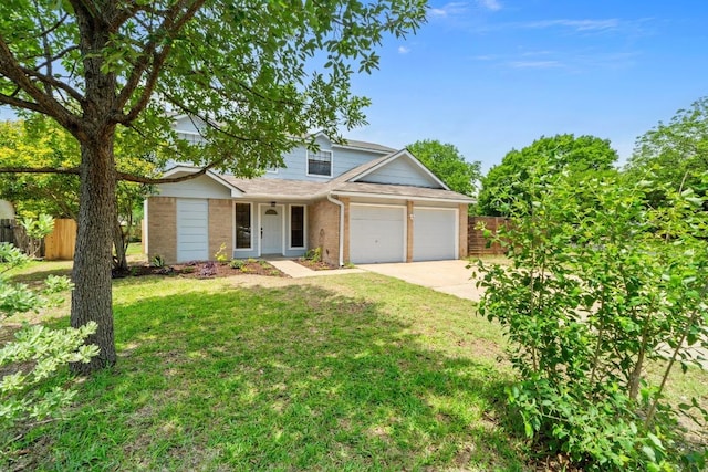 11708 Rotherham Dr, Austin, TX 78753 - traditional-style home featuring an attached garage, driveway, and brick siding