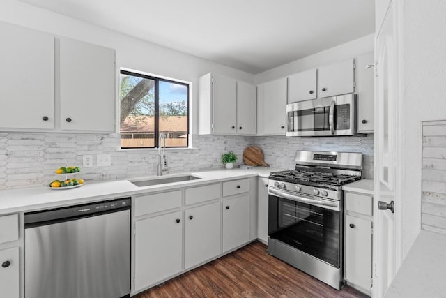11708 Rotherham Dr, Austin, TX 78753 - kitchen with appliances with stainless steel finishes, backsplash, and light countertops