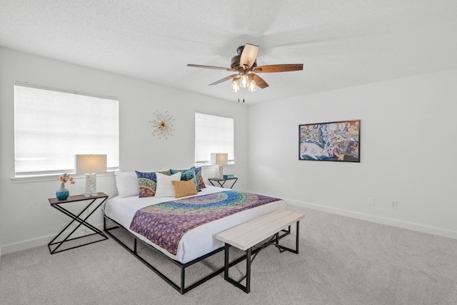 11708 Rotherham Dr, Austin, TX 78753 - carpeted bedroom featuring baseboards and a ceiling fan
