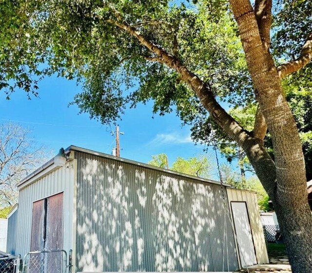 101 Byrne St, Smithville, TX 78957 - view of home's exterior with an outbuilding